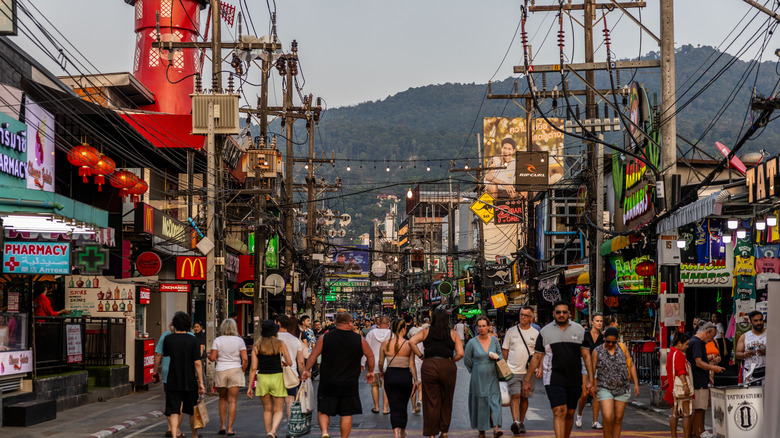 Neon-lit signs on Phuket street