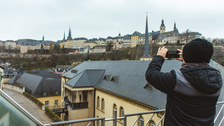 Tourist clicking a picture of Luxembourg architecture