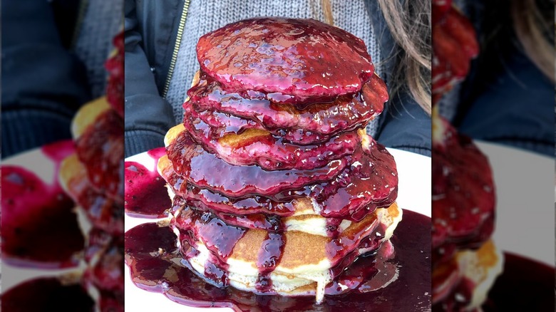 Stack of pancakes at Town Square Buffet covered in blueberry sauce