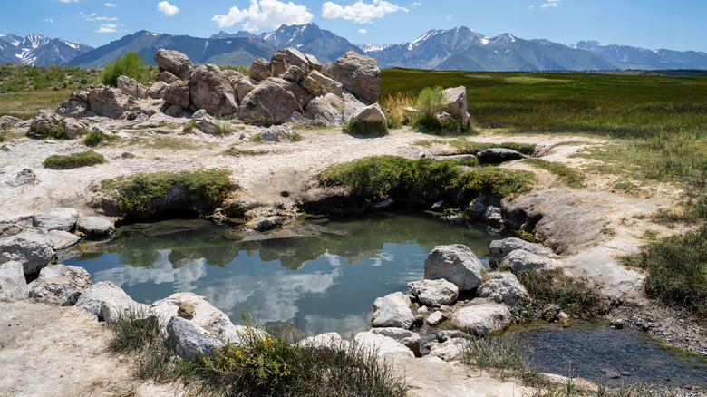 natural hot spring pools by mountains