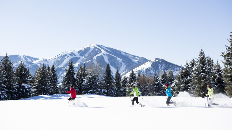 Family goes snowshoeing at Sun Valley in Idaho.