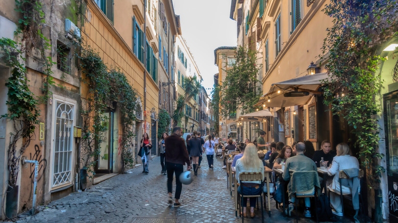 People on a street in the Trastevere neighborhood of Rome