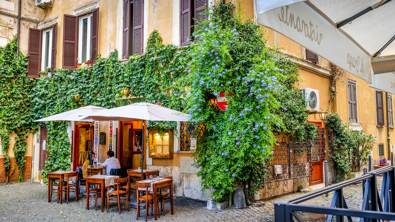 outdoor dining on cobblestone street