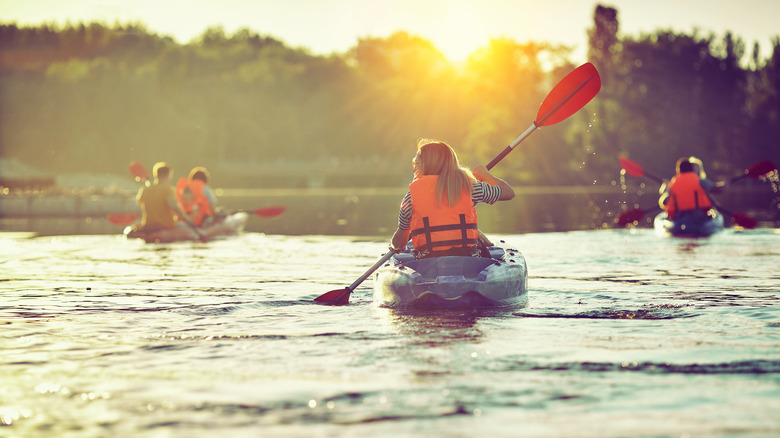 Woman and friends kayaking