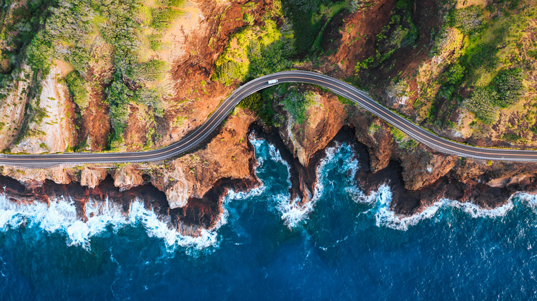 Van on coastal road on Oahu