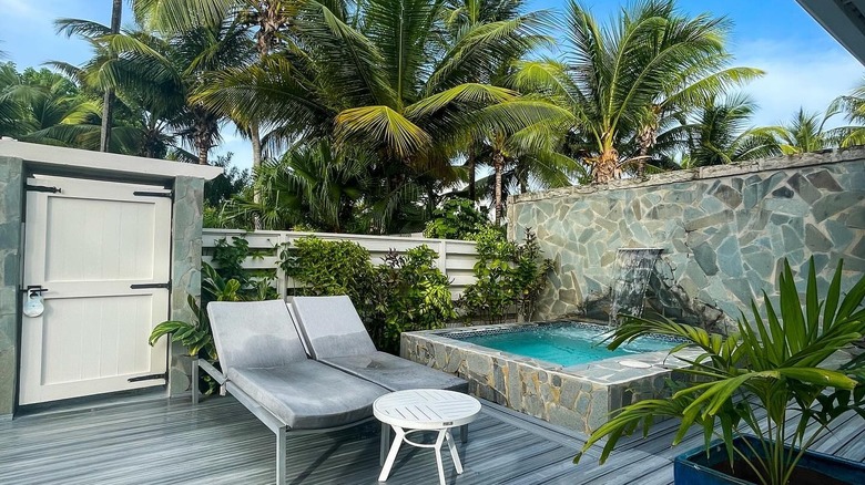 Lounge chairs and plunge pool at Serenity at Coconut Bay, Saint Lucia