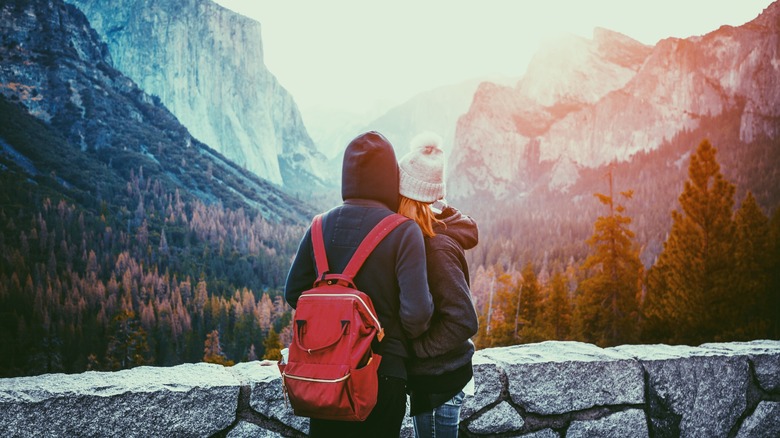 Couple standing at Yosemite tunnel view