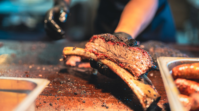 Chef prepares barbecue meat