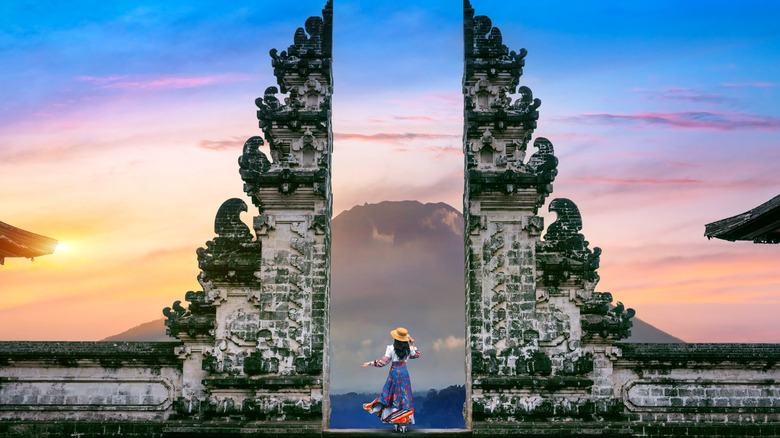 Woman at temple in Indonesia