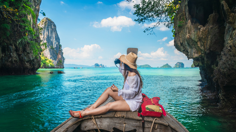 Girl on boat in Thailand