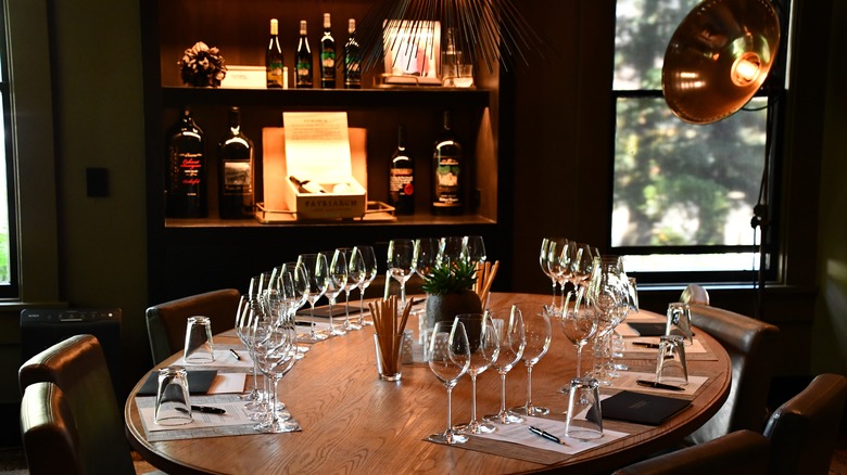 Tasting room with wine glasses in Frank Family Vineyards