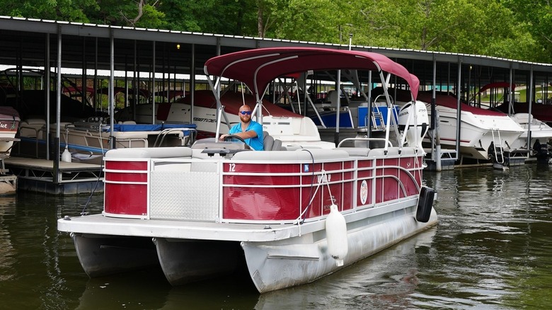 A man on a rented pontoon boat