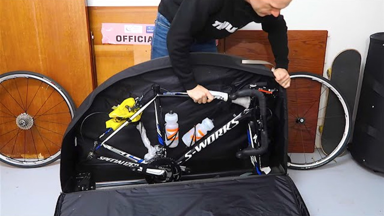 Man fits bike into air travel soft-sided case