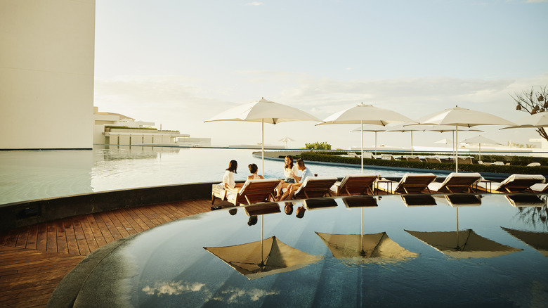 Family at a resort pool