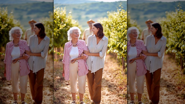 Mother and daughter in vineyard