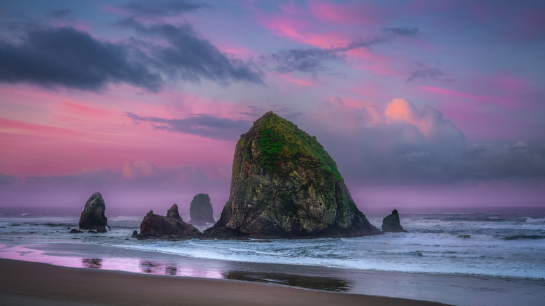 pink clouds over Haystack Rock