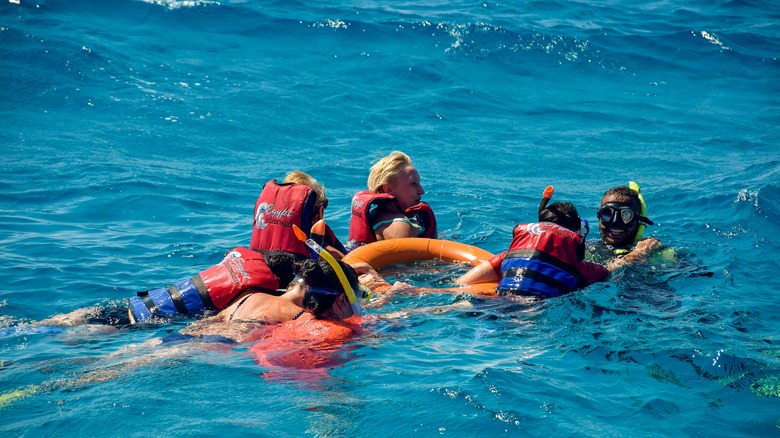 snorkelers with a ring buoy