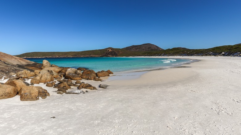 Blue waters of Hellfire Bay