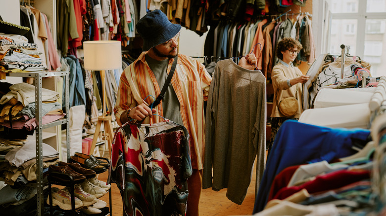 Person shopping in thrift store