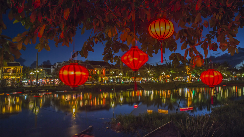 Hoi An at night lit by lanterns.