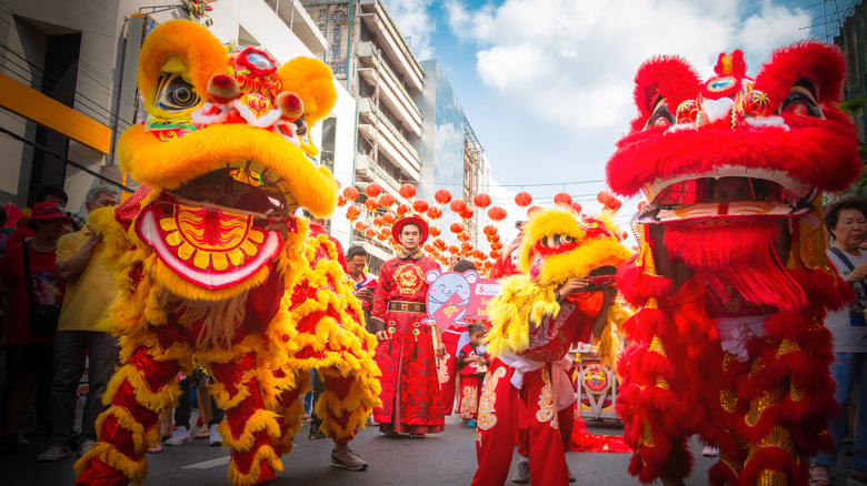 People performing lion dance in Bangkok