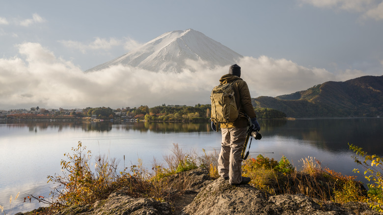 Man looks at Mt. Fuji