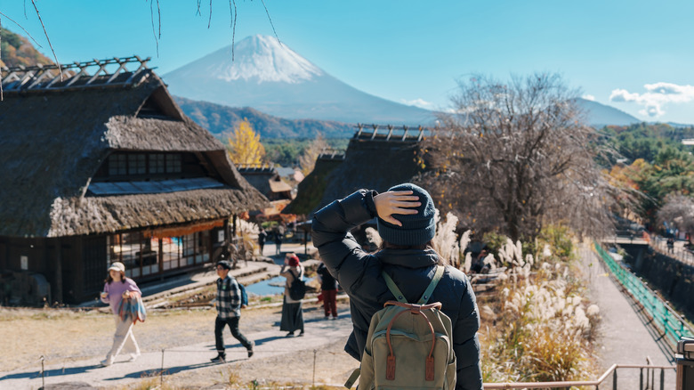 Woman looks at Mount Fuji