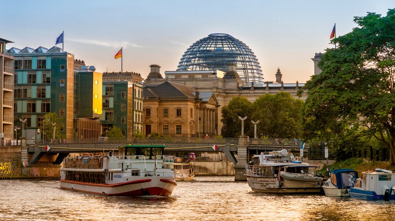 Sunset over Spree River and government buildings