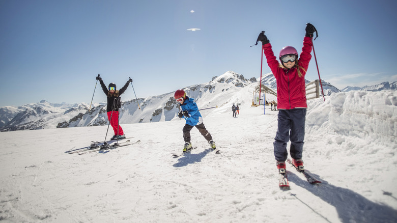 A family skiing together