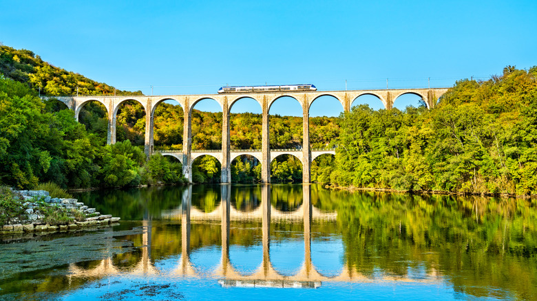 Train crossing the Cize-Bolozon viaduct on the way to Geneva.