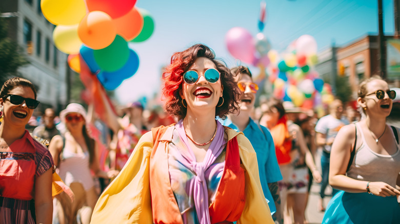 An LGBTQ+ festival and a woman smiling in Norway in 2023