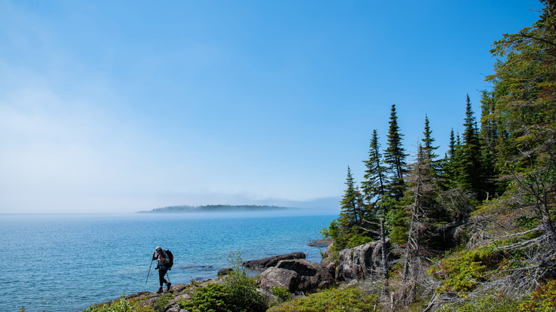 Backpacker hiking Isle Royale NP