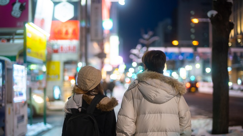 Couple walking at night