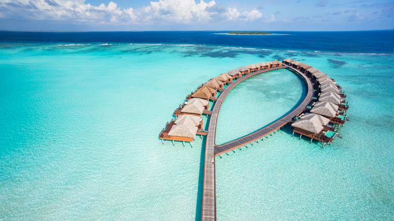 Overwater bungalows on tropical seas