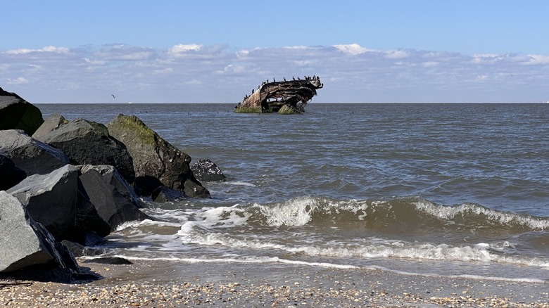 The USS Atlantus shipwreck visible from Sunset Beach in New Jersey