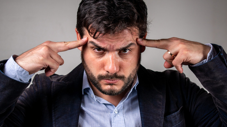 Man pretending to mind read