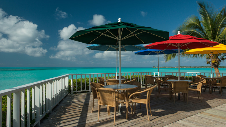 Colourful umbrellas by the sea at a resort in the Bahamas