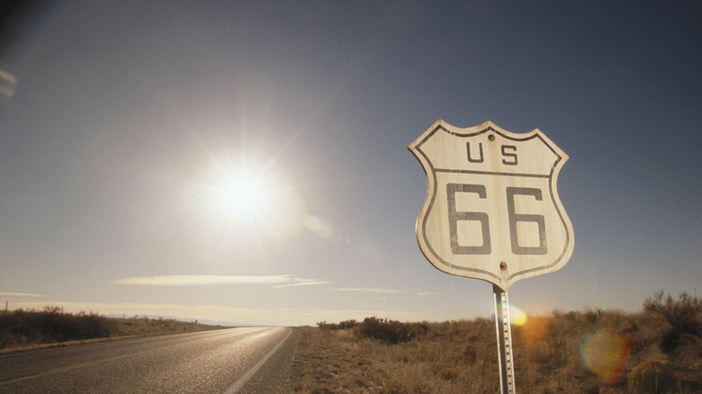 Route 66 sign on desert road