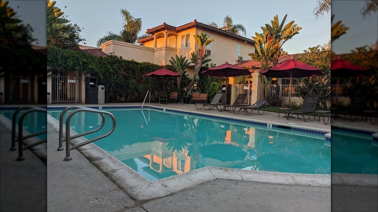 Exterior of Old Town Inn with pool