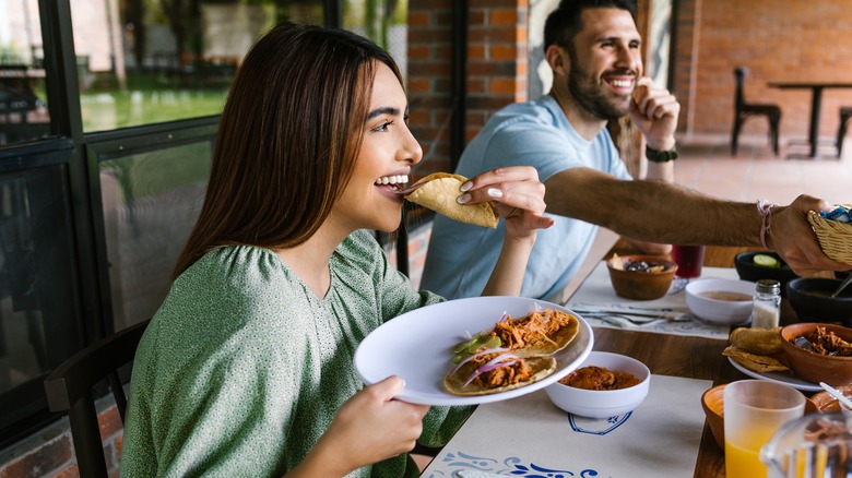 people eating tacos in Mexico