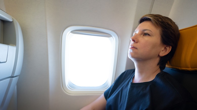 Person who is upset on a plane