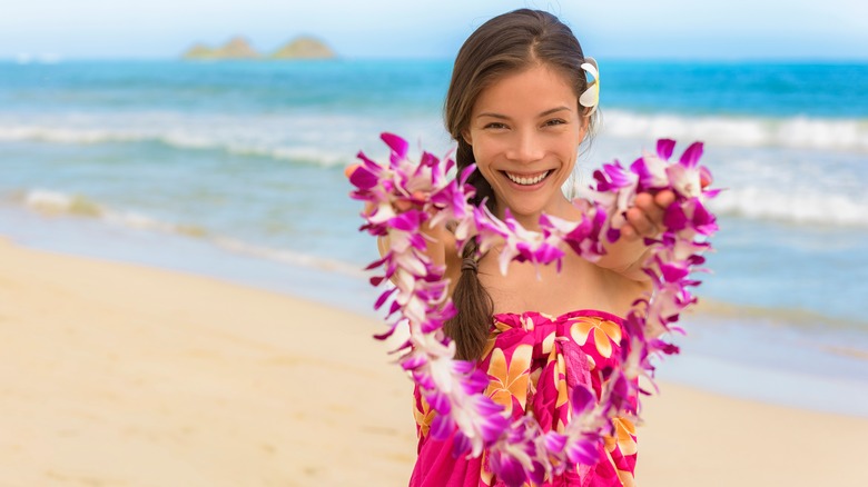 Woman holding a lei