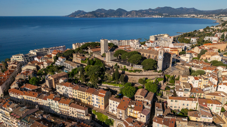 The French city of Cannes from above, the sea, and the mountains