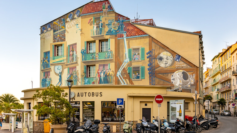 Cannes Les Murs Peints mural on the facade of a bus station