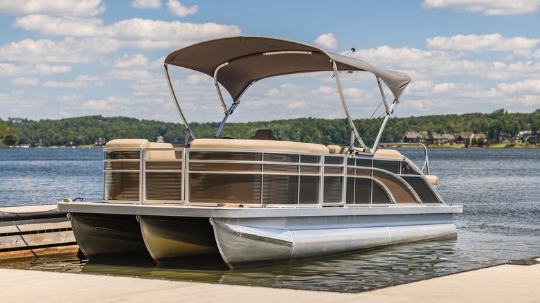 docked pontoon boat