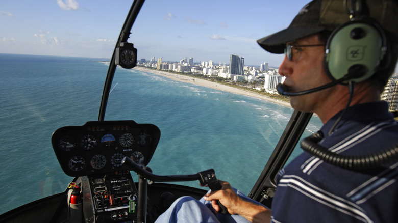 helicopter pilot flying over Florida