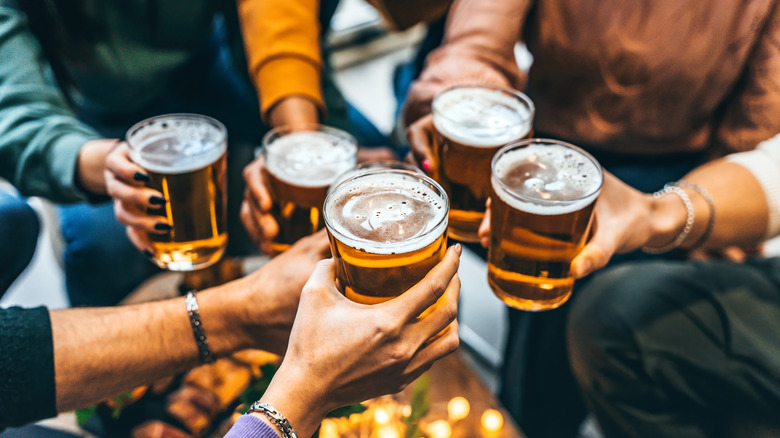 groups toasting beers