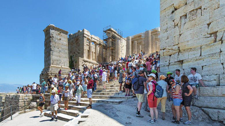 Tourists all over Athens' Acropolis