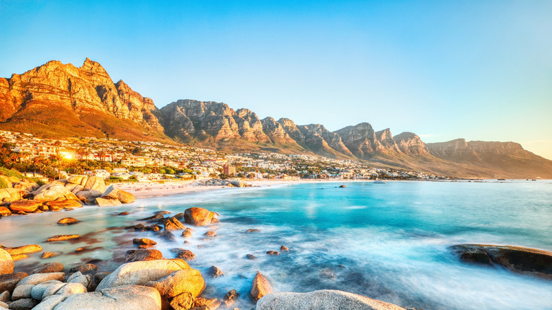 Cape Town sunset over Camps Bay Beach, Table Mountain in the background