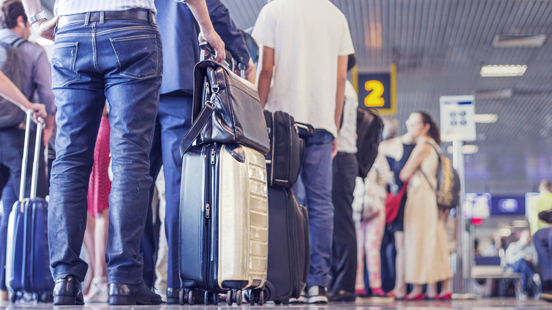 Travelers waiting to board a plane